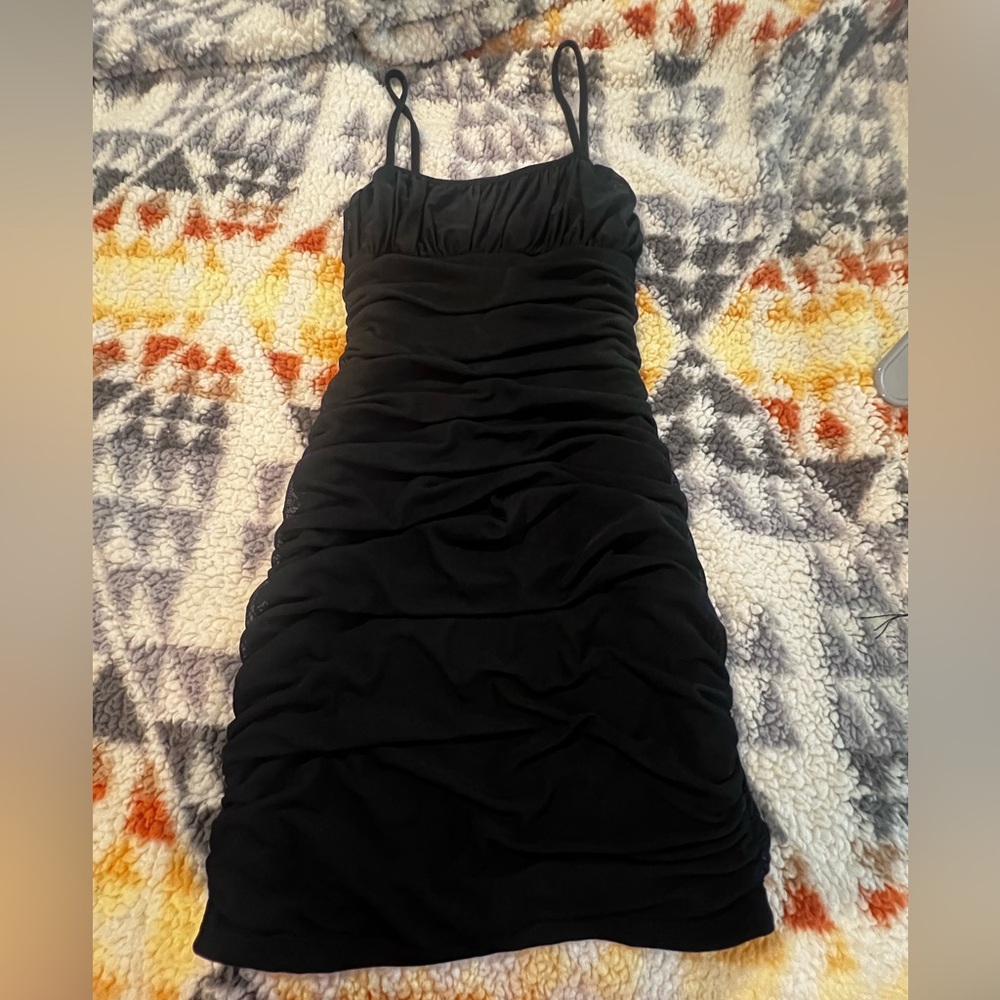 Black dress with ruffles, spaghetti straps
